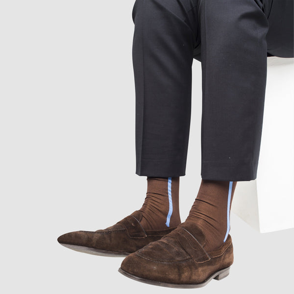 a man wearing mercerized cotton socks in brown