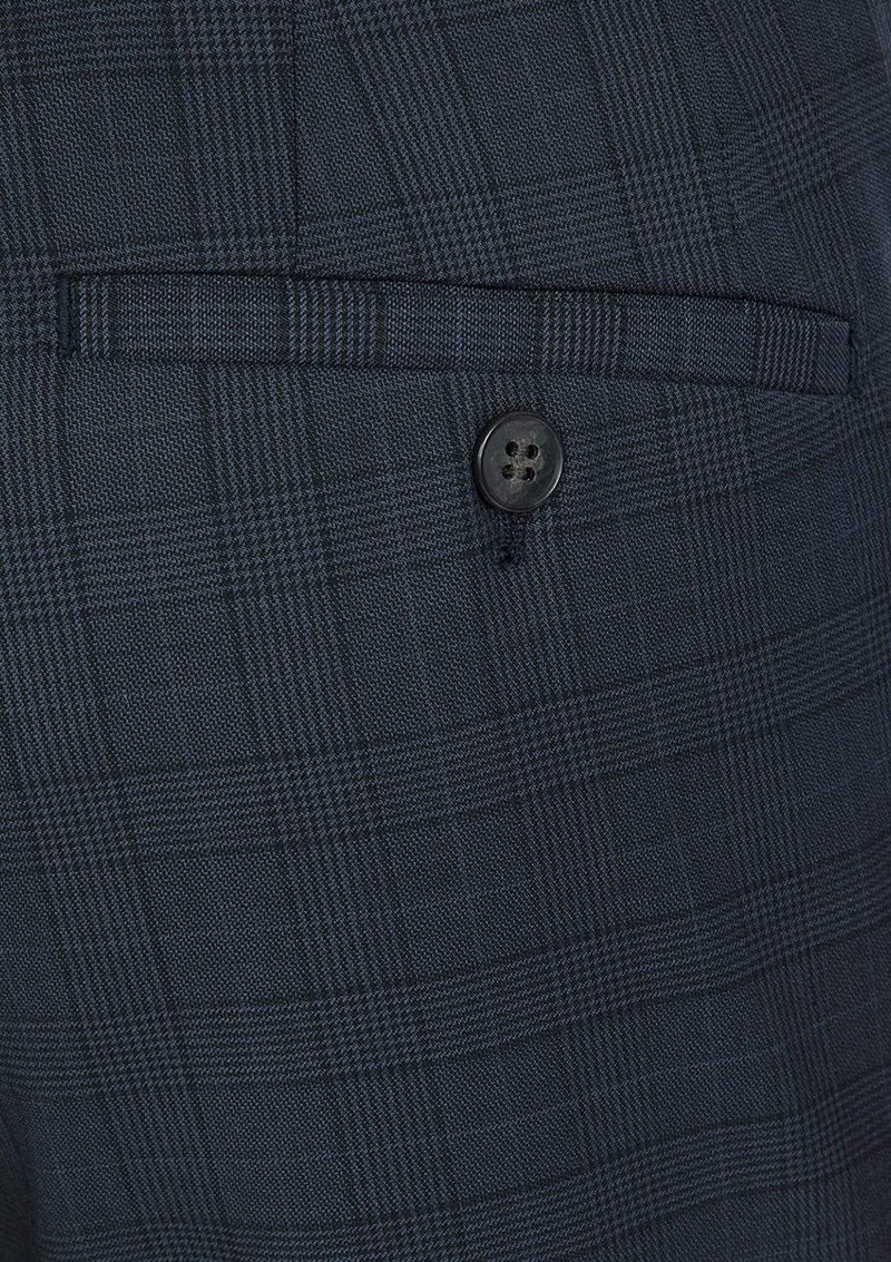 a close up fo the navy check wool fabric on the gibson slim fit caper trouser product code FG1614