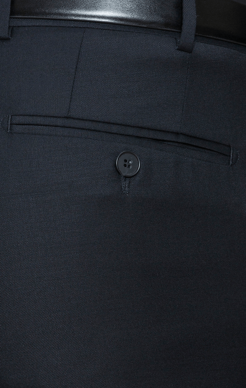 a close up view of the pocket detail on the cambridge interceptor trousers in navy wool blend F262
