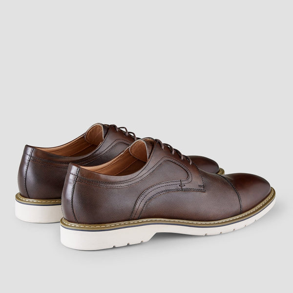 aquila jonson mens leather dress shoe in chocolate brown showing the perforated leather pattern