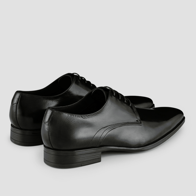 a side view of the markus black leather dress shoe by aquila 