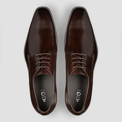 a pair of brown leather shoes from aquila in a smooth shiny finish