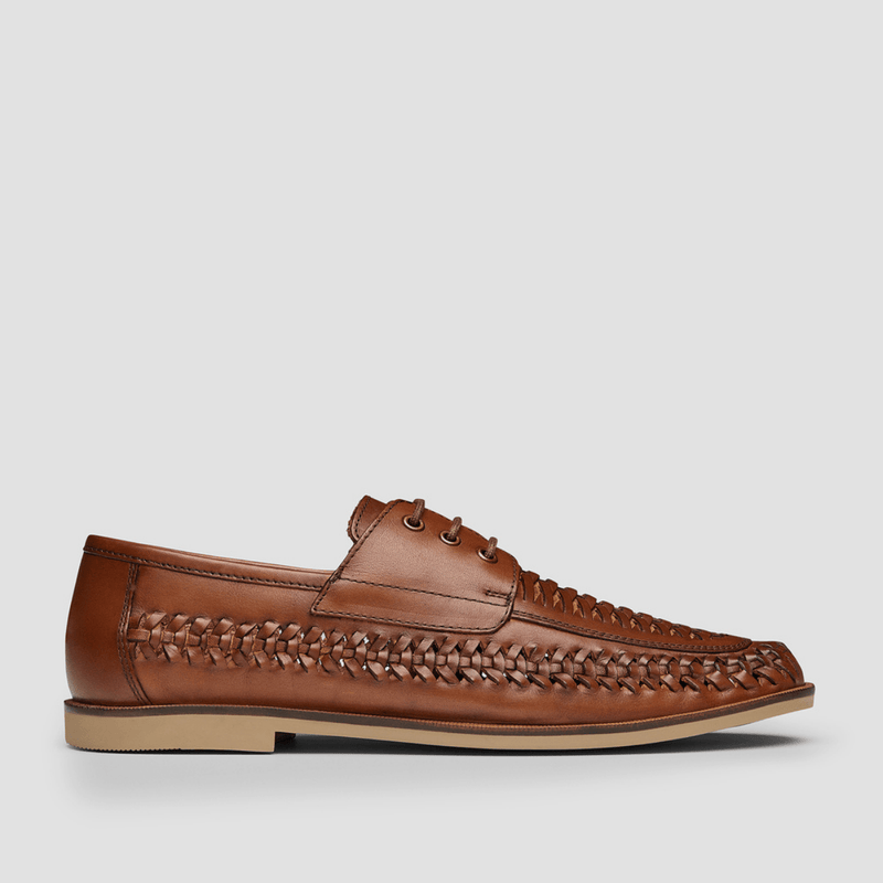 a tan leather show with braided detail and easy to slip on from aquila mens shoes