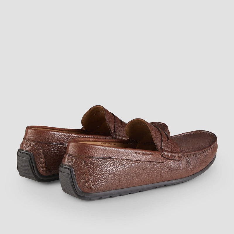 the soft textured tan leather of the mens aquila tan hewitt loafer