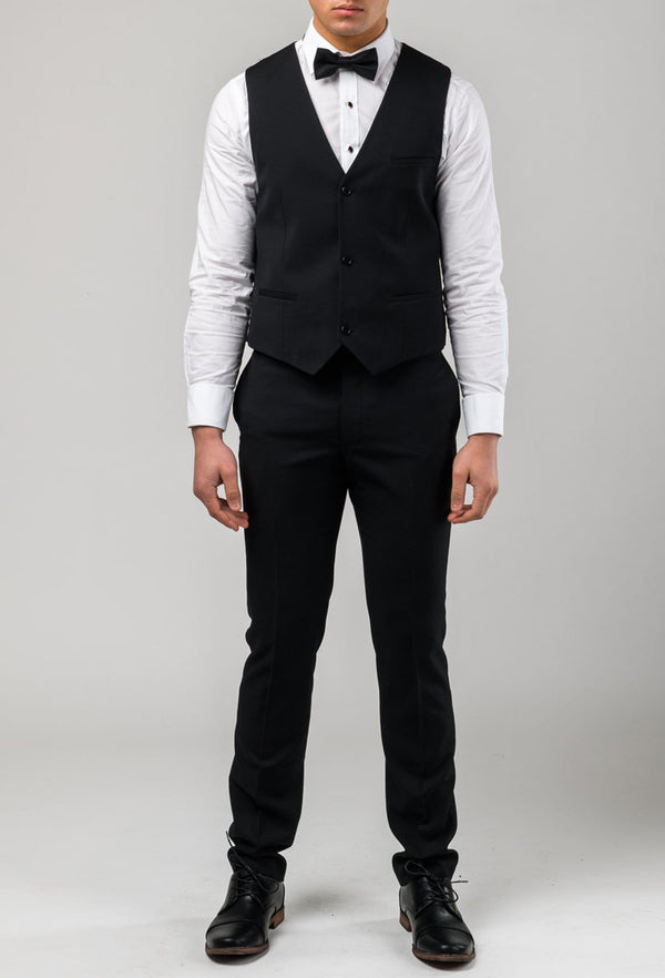 a picture of a model wearing the Aston slim fit laneport vest in black A019301V styled with a white shirt and black bow tie