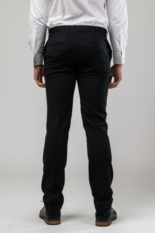 A reverse view of the trouser in the Aston slim fit laneport trouser in black A019301T