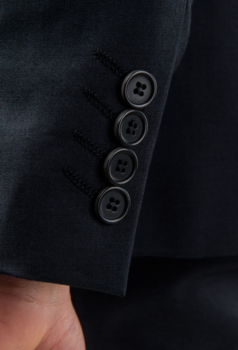 A close up of the button details on the Aston slim fit laneport suit in charcoal A029301S