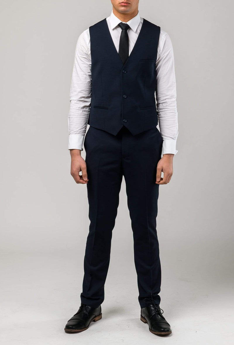 a full length view of the Aston slim fit laneport vest in navy A049301V styled with the lane port trouser