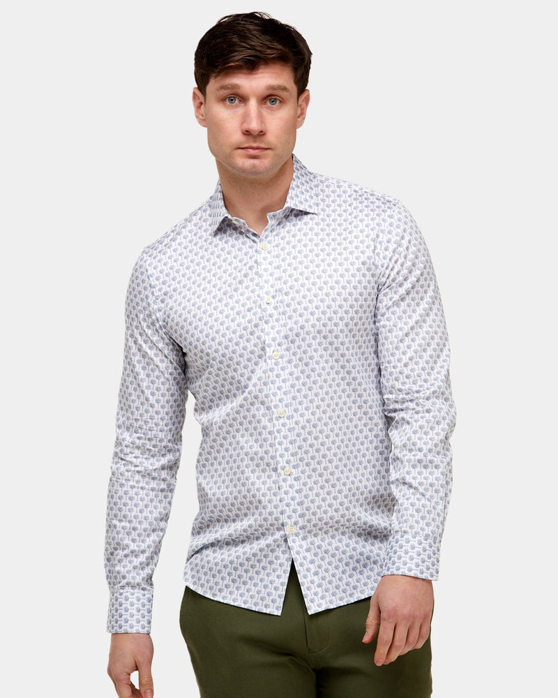 a slim fit mens long sleeve shirt in white cotton with a light blue print all over