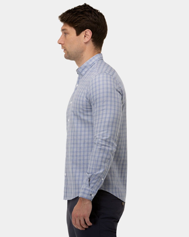 a slim fit mens shirt with a blue plaid print all over 