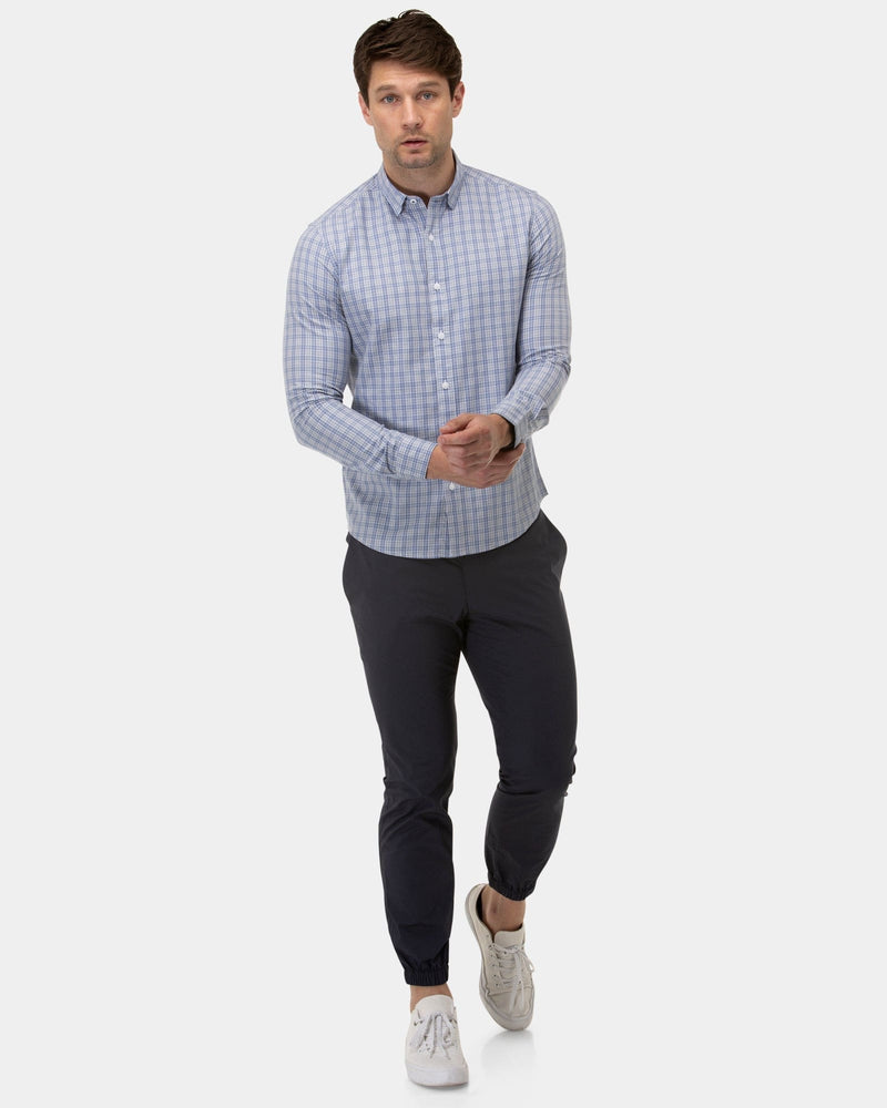 the brooksfield staple shirt in blue plaid with a navy blue chino pant and white sneakers