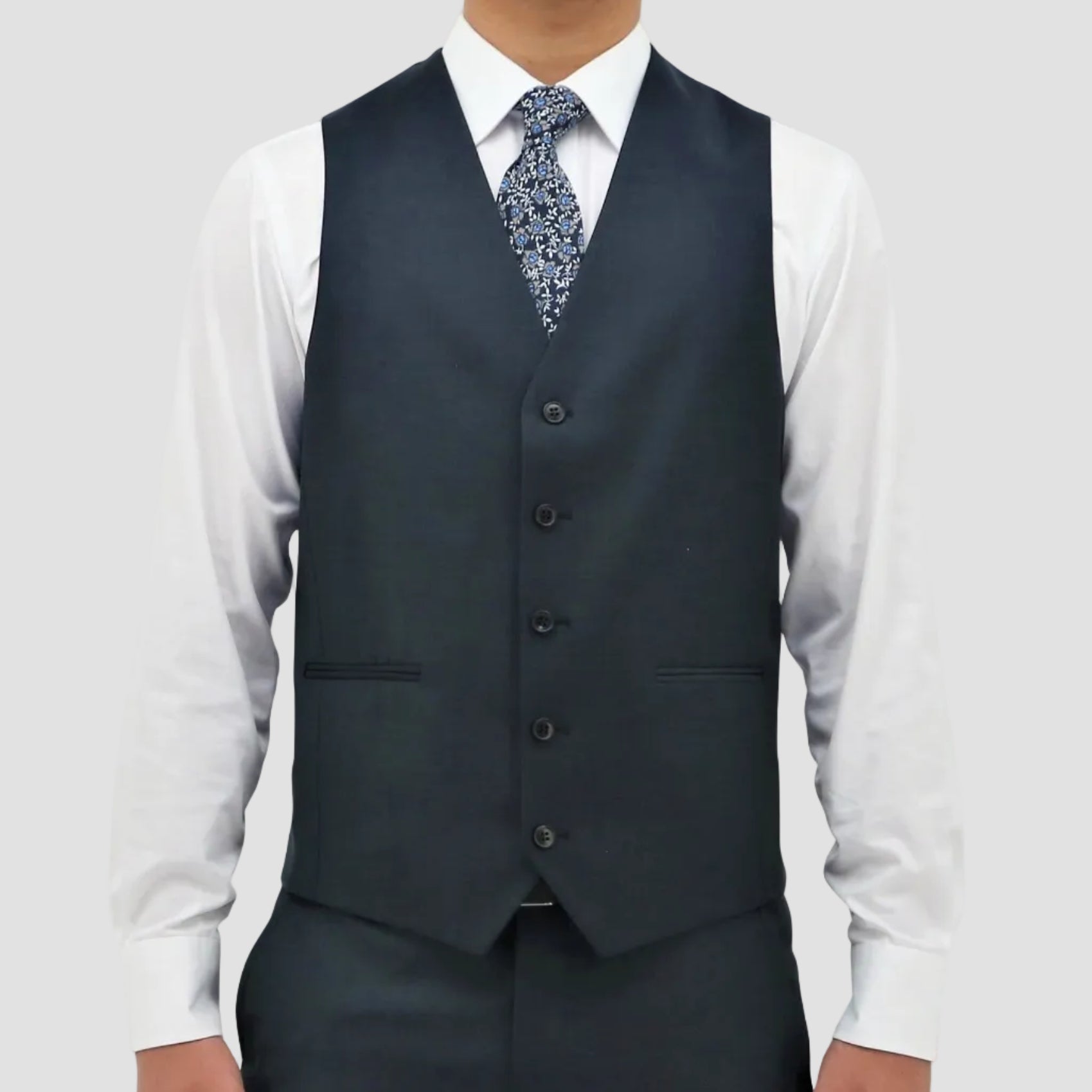 Boston’s Ryan blue vest in classic fit with a five‑button front and jetted pockets.