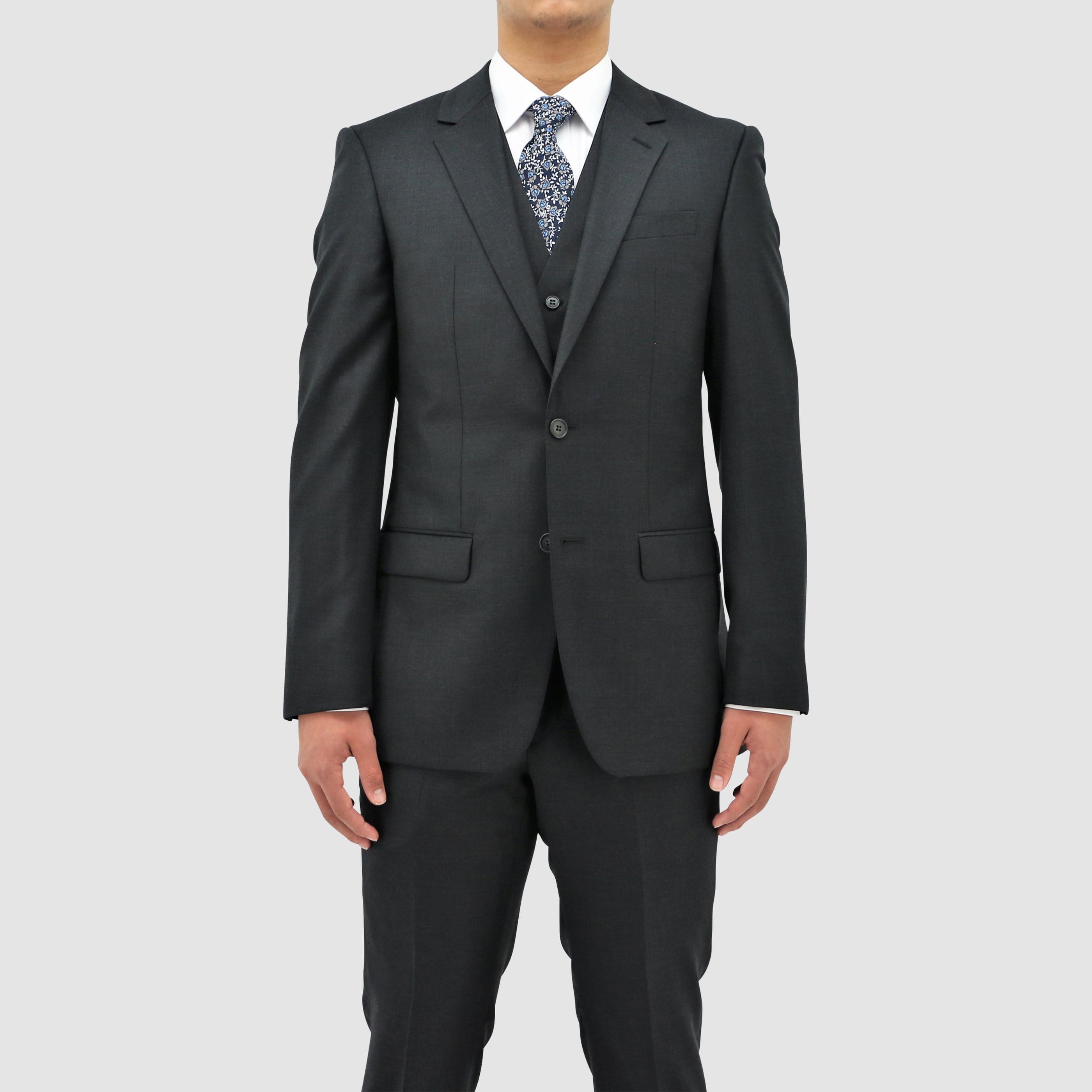 Boston’s Michel charcoal comfort‑fit suit with notch lapel, flap pockets and straight‑leg trousers.