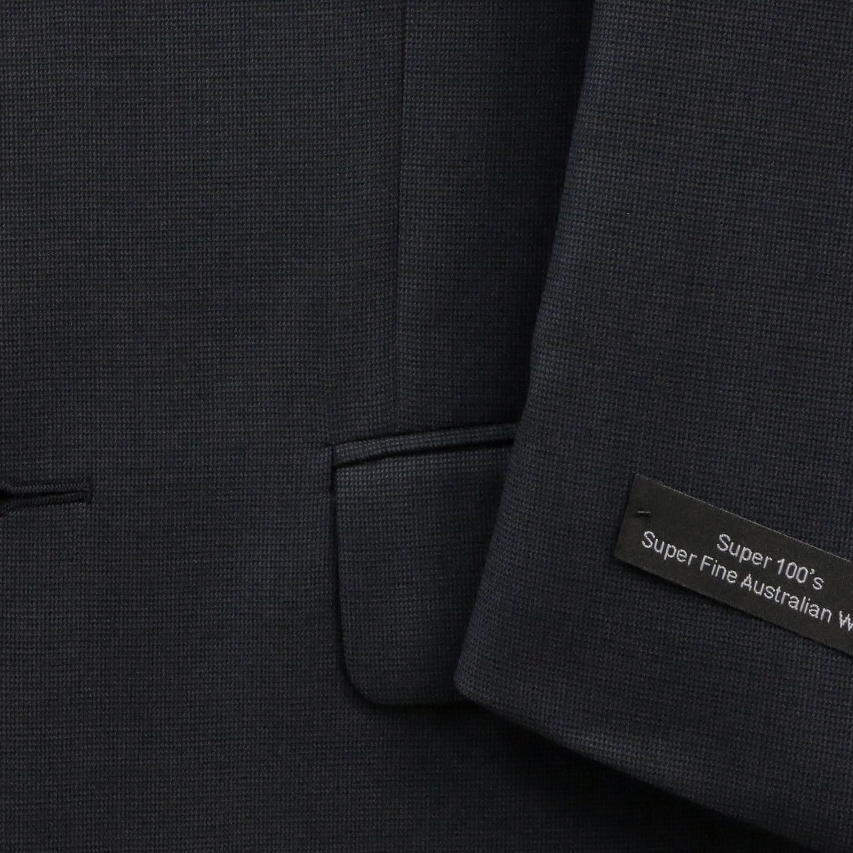 Boston’s Michel navy comfort‑fit suit with notch lapel, flap pockets and straight‑leg trousers. 