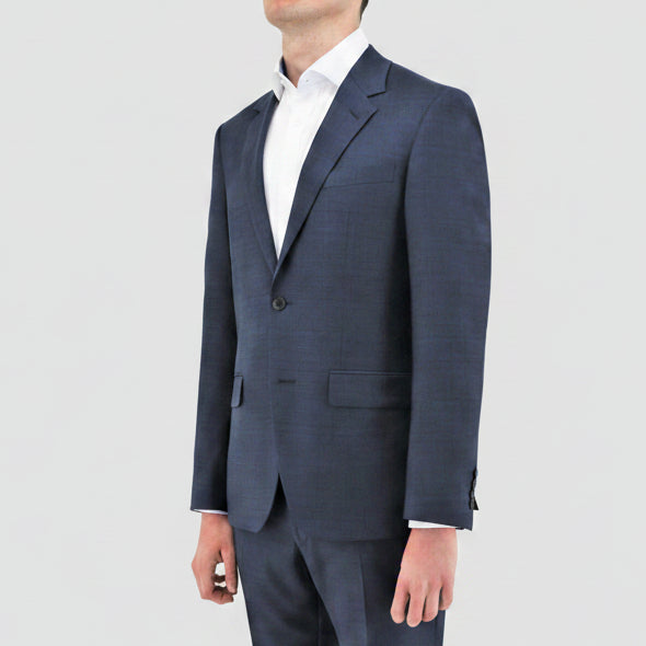 A refined Boston Shape navy slim‑fit suit crafted from breathable merino wool with clean, modern tailoring and Edward trousers.