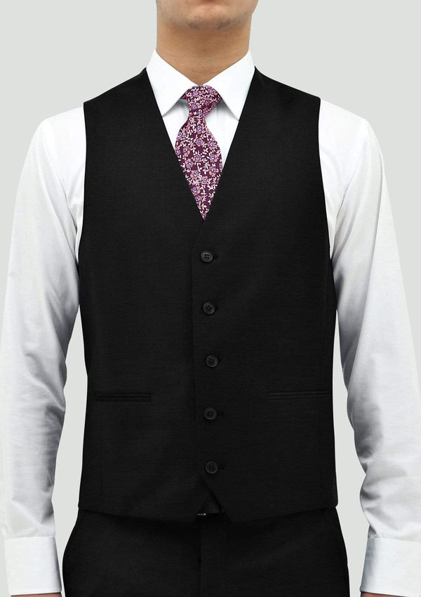 a front view of a model wearing the boston classic fit ryan mens suit vest in black pure wool STB106-01