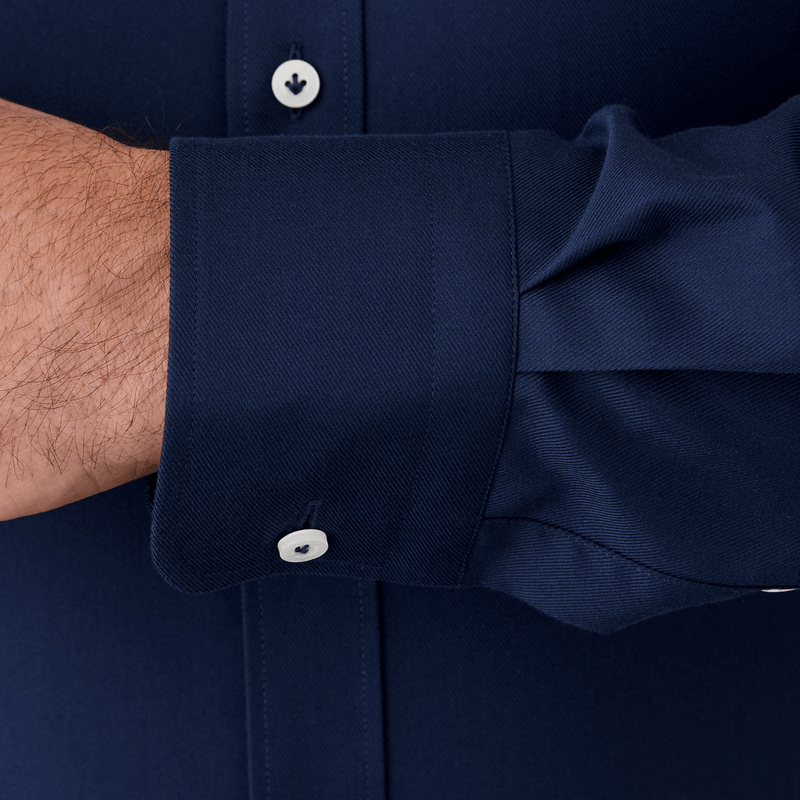 close up cuff detail on the mens navy shirt FCP250