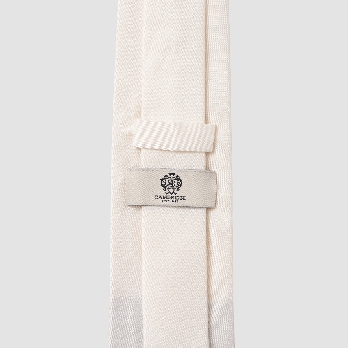 the back of the mens cambridge neck tie in ivory