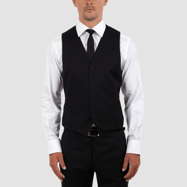 mens slim fit taurus vest in black with a white shirt and black tie
