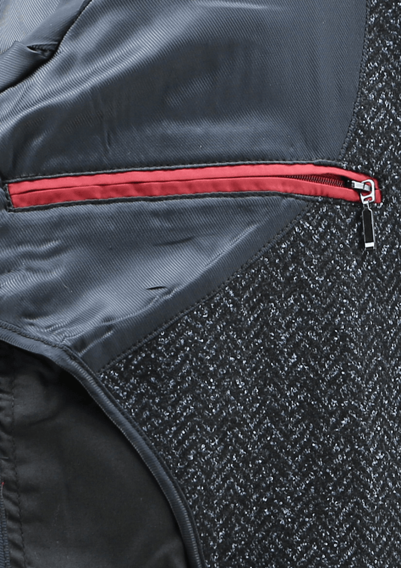 the inner hidden zip pocket of the raphael mens overcoat by daniel hechter with red trim and a silver zipper