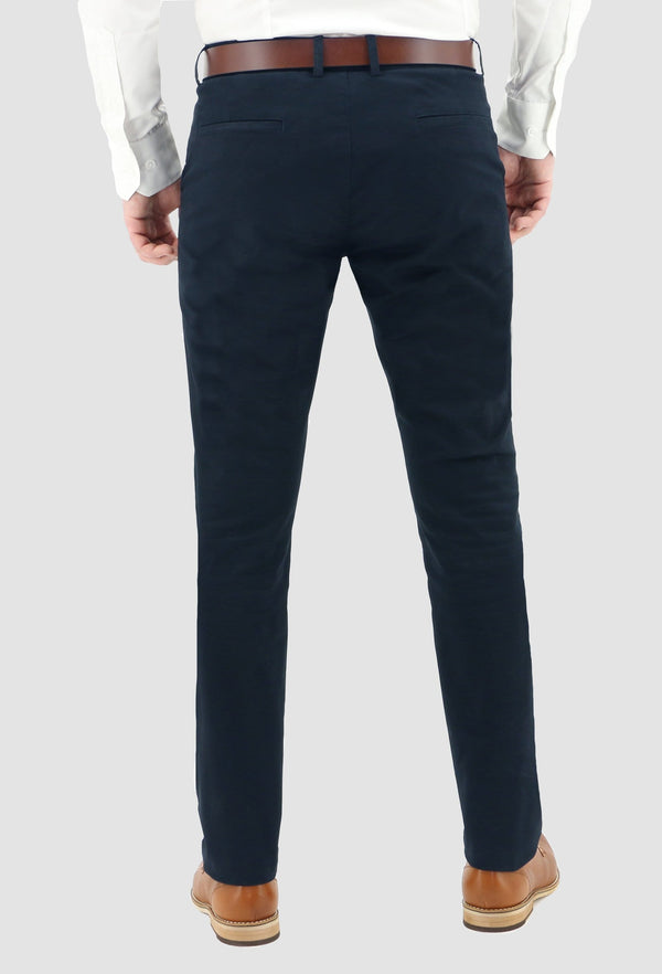 the rear view of the daniel hechter slim fit navy cotton stretch chinos worn with a white shirt and a tan leather shoe
