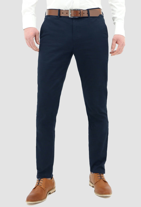 a front on view of the daniel hechter slim fit navy cotton stretch chinos worn with a white shirt and a tan leather shoe