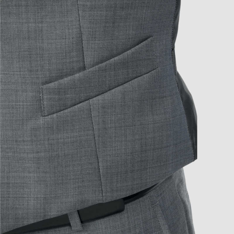 the front pockets of the mens suit vest in grey by gibson suits