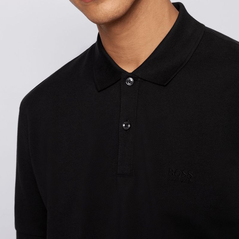close up of the two button collar on the hugo boss pallas pima cotton polo in black cotton