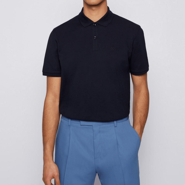 a front view of the classic fit navy blue polo by hugo boss with a small embroidered boss logo on the front in matching thread