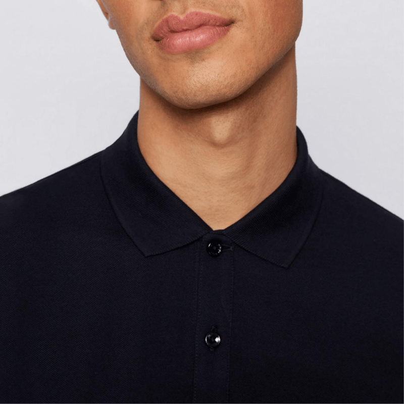 a close up fo the boss pallas polo in dark blue with two button placket