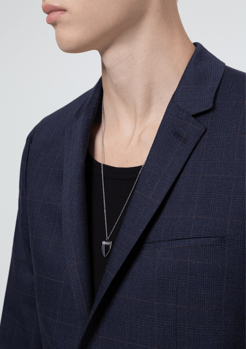 the hugo anfred blazer jacket on a model showing a close up of the peak lapel detail