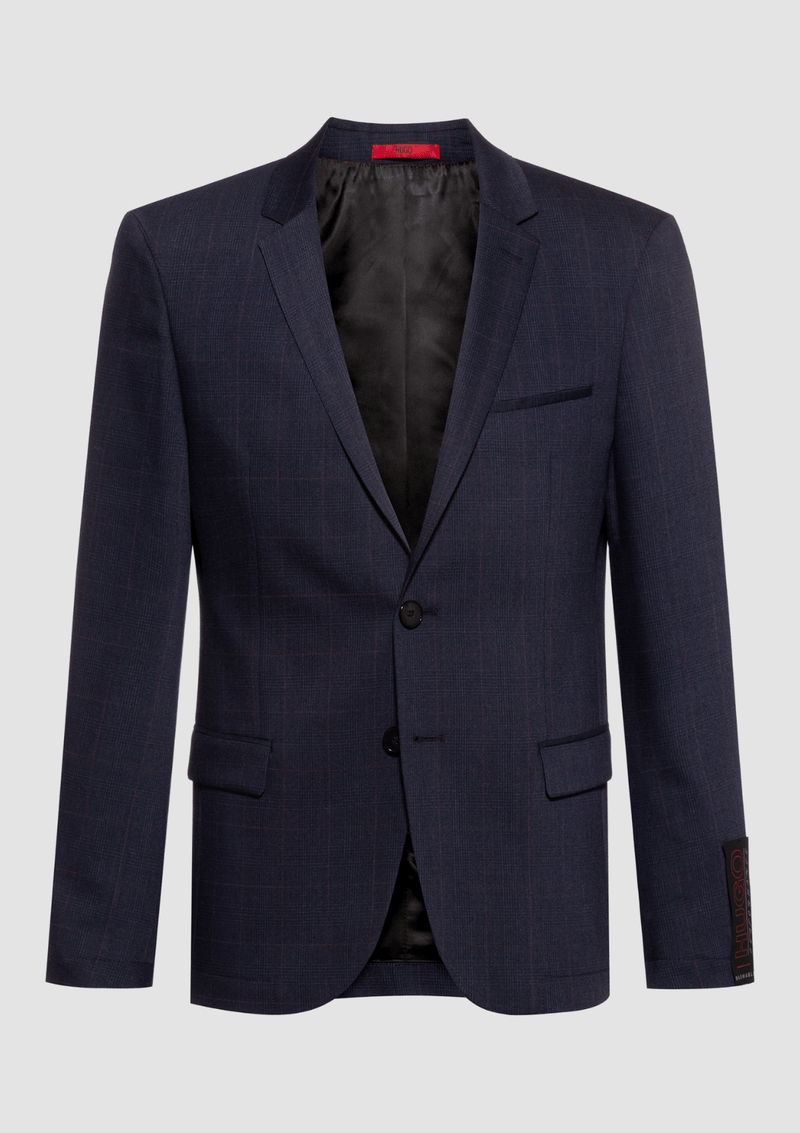 the hugo blazer slies on a plain background showing the satin like black lining and slim fit shape of the jacket