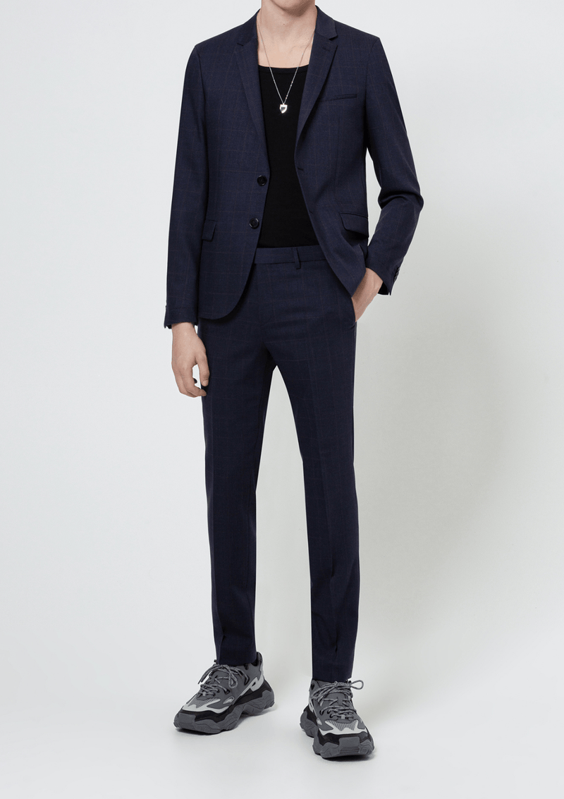 a full length view of the hugo menswear anfred slim fit suit in navy