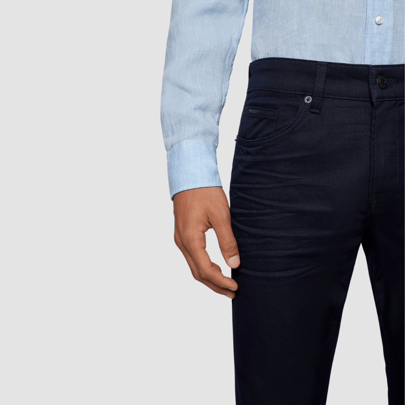 a close up view of the waist and front pockets of the hugo boss delaware mens jeans