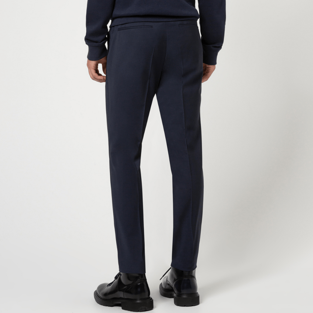 Dark blue slim‑fit Getlin trousers by Hugo featuring a flat front and hook‑and‑zip closure. 