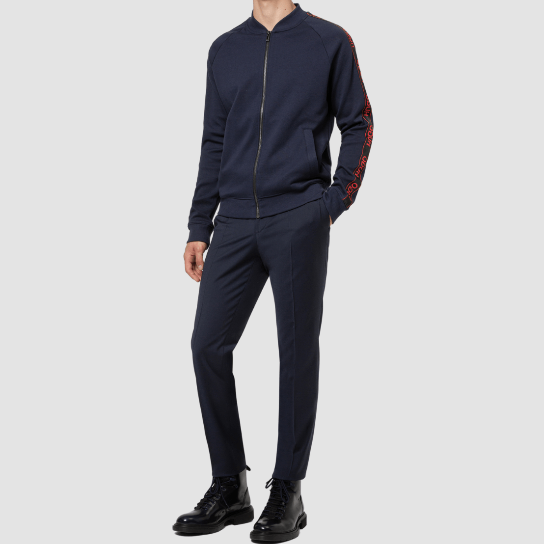Dark blue slim‑fit Getlin trousers by Hugo featuring a flat front and hook‑and‑zip closure. 