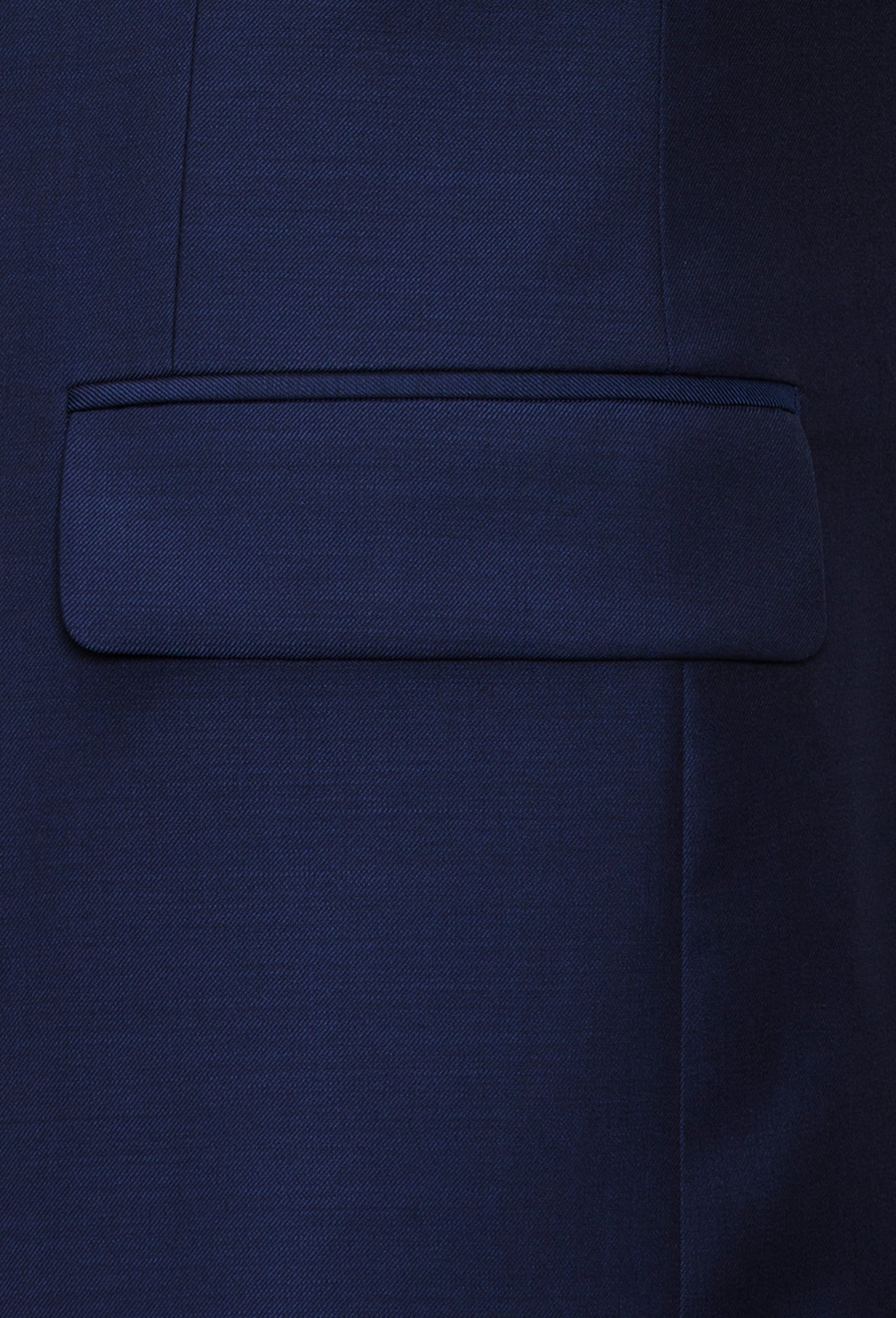 A close up view of the Joe Black slim fit anchor suit jacket pocket in navy pure wool FJY100