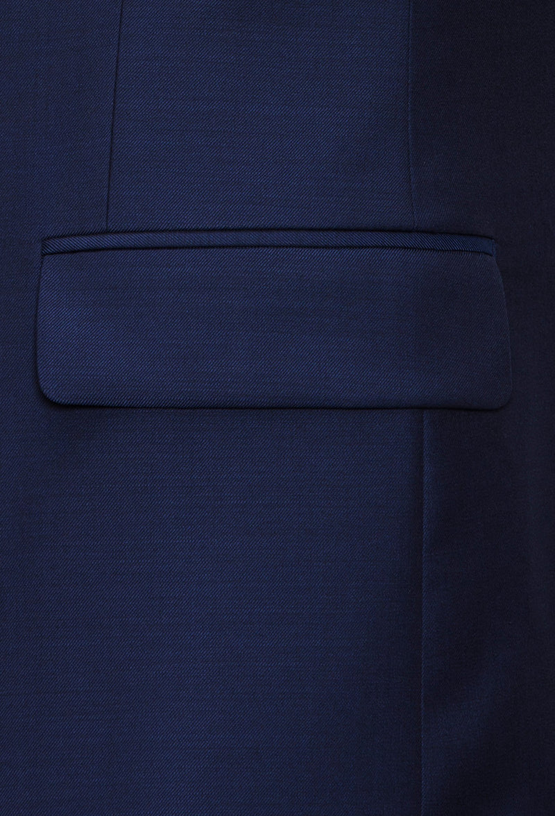 A close up view of the Joe Black slim fit anchor suit jacket pocket in navy pure wool FJY100