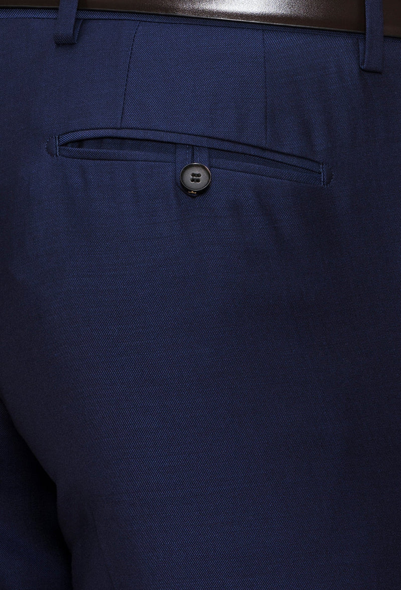 a close up view of the rear hip pocket detail on the Joe Black slim fit razor trouser in navy pure wool