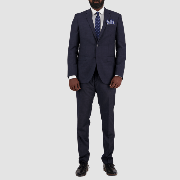 mens tailored fit navy blue suit styled with a white shirt and blue printed tie