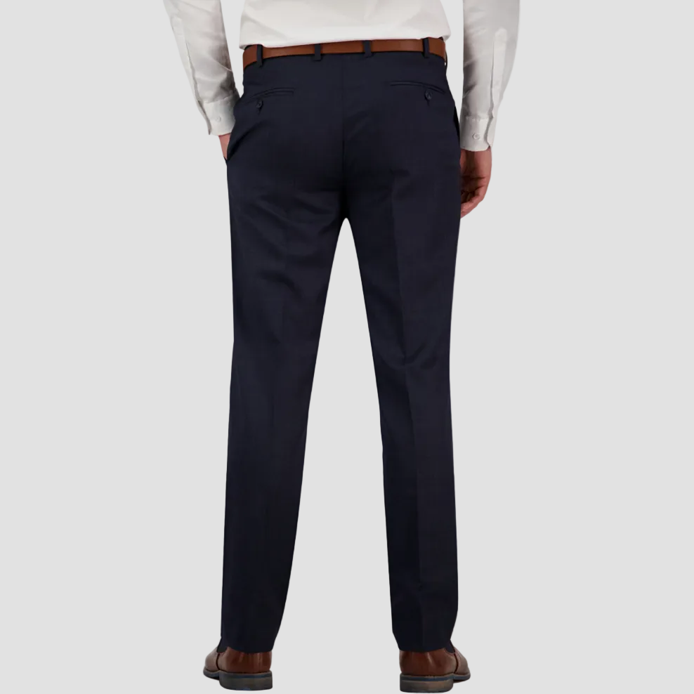 Navy dress pants in Australian merino wool by Savile Row worn with a white shirt and brown leather belt and boots.