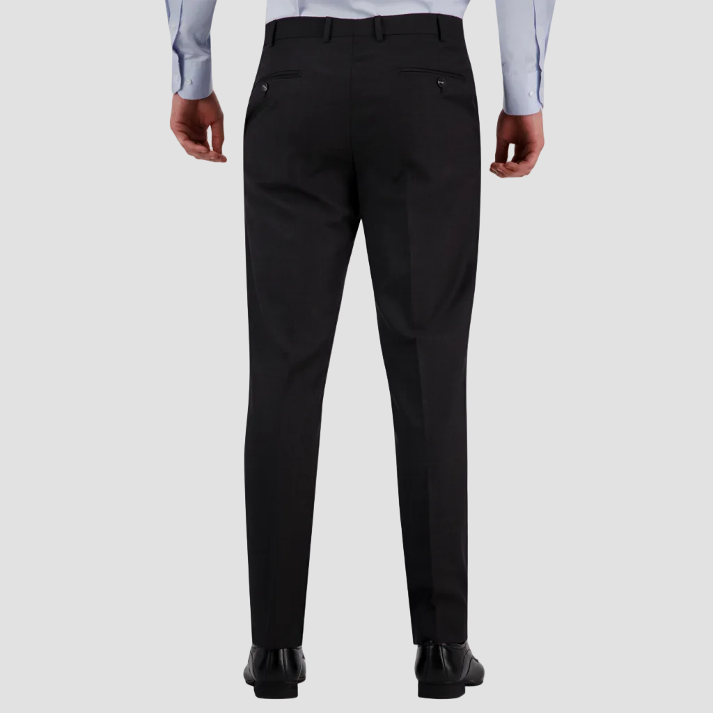 Classic fit charcoal travel‑finish wool trouser by Savile Row with black leather shoes.