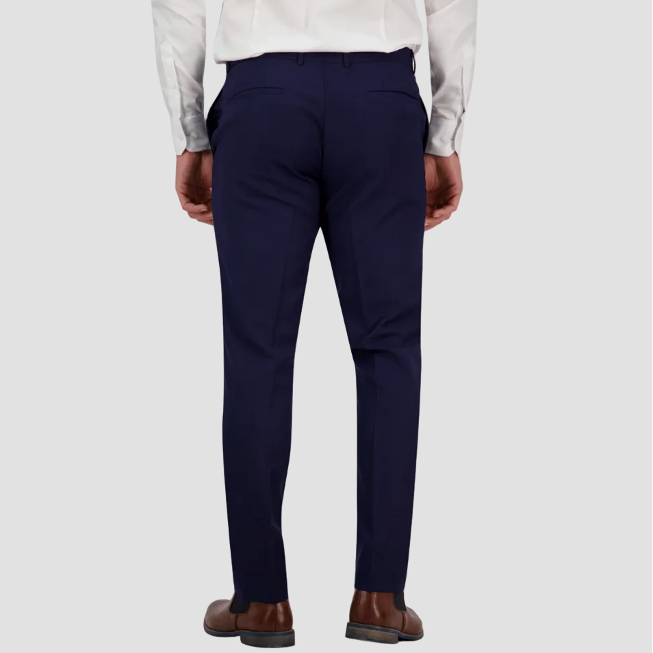 Navy blue dress pants by Savile Row with a white shirt and brown leather shoes.