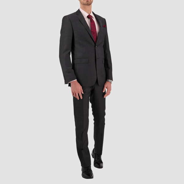 the mens tailored fit charcoal suit with a light pink shirt and a red mens tie