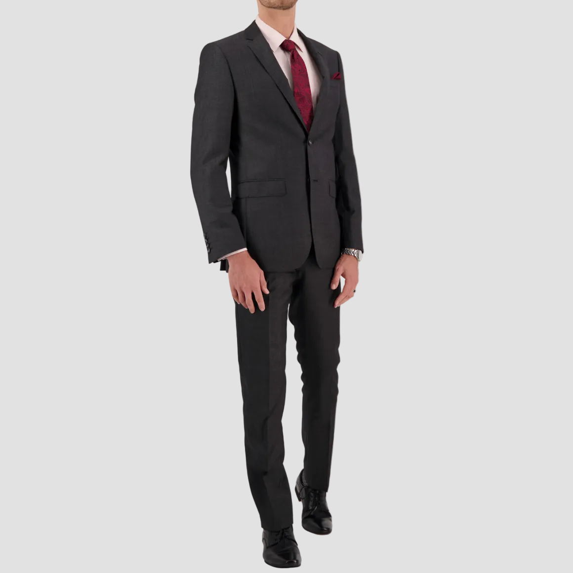 A tailored charcoal textured suit in Super 110’s Merino by Savile Row for comfort and polish.