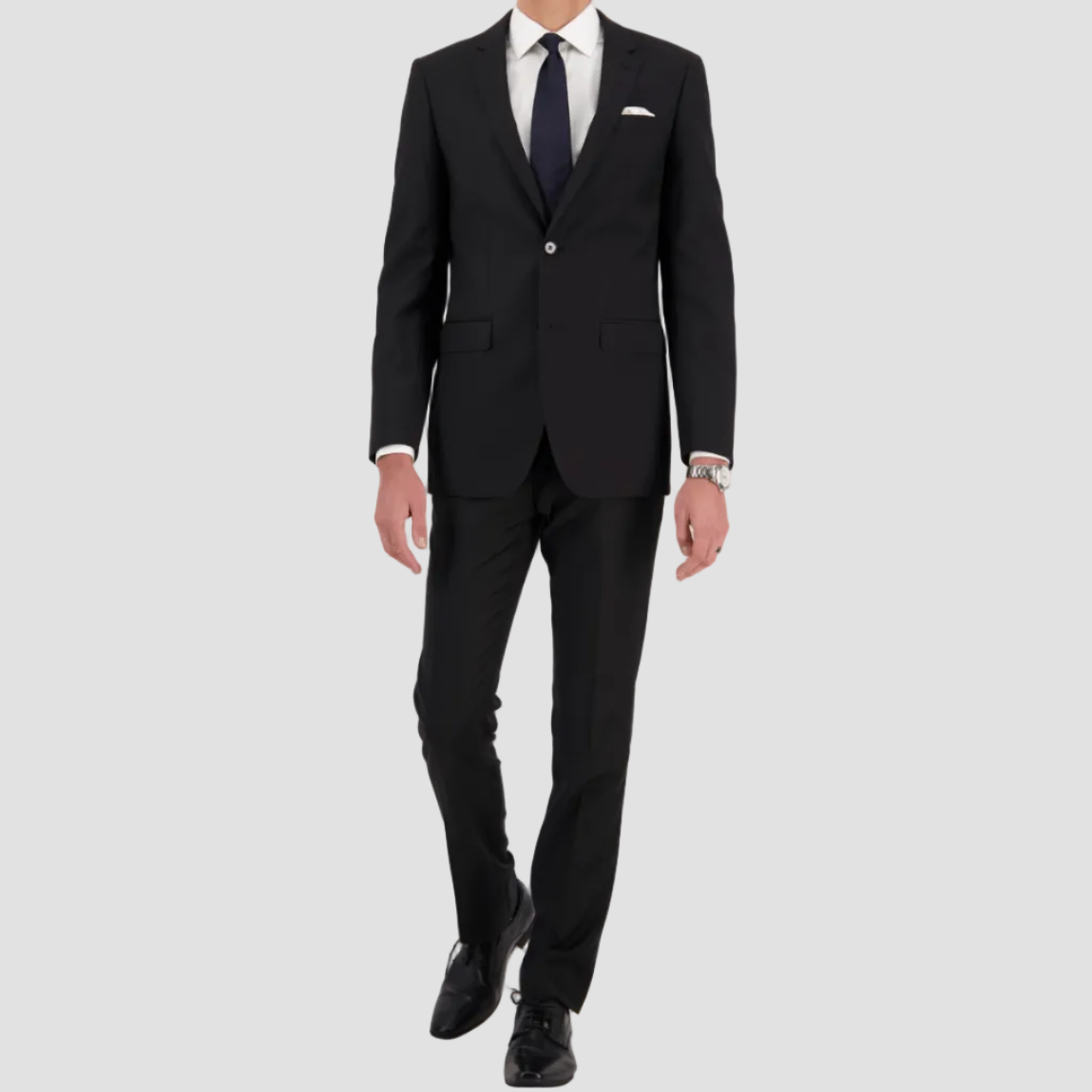 Black travel‑finish wool suit by Savile Row, tailored in Super 110’s Merino with a clean, structured fit.