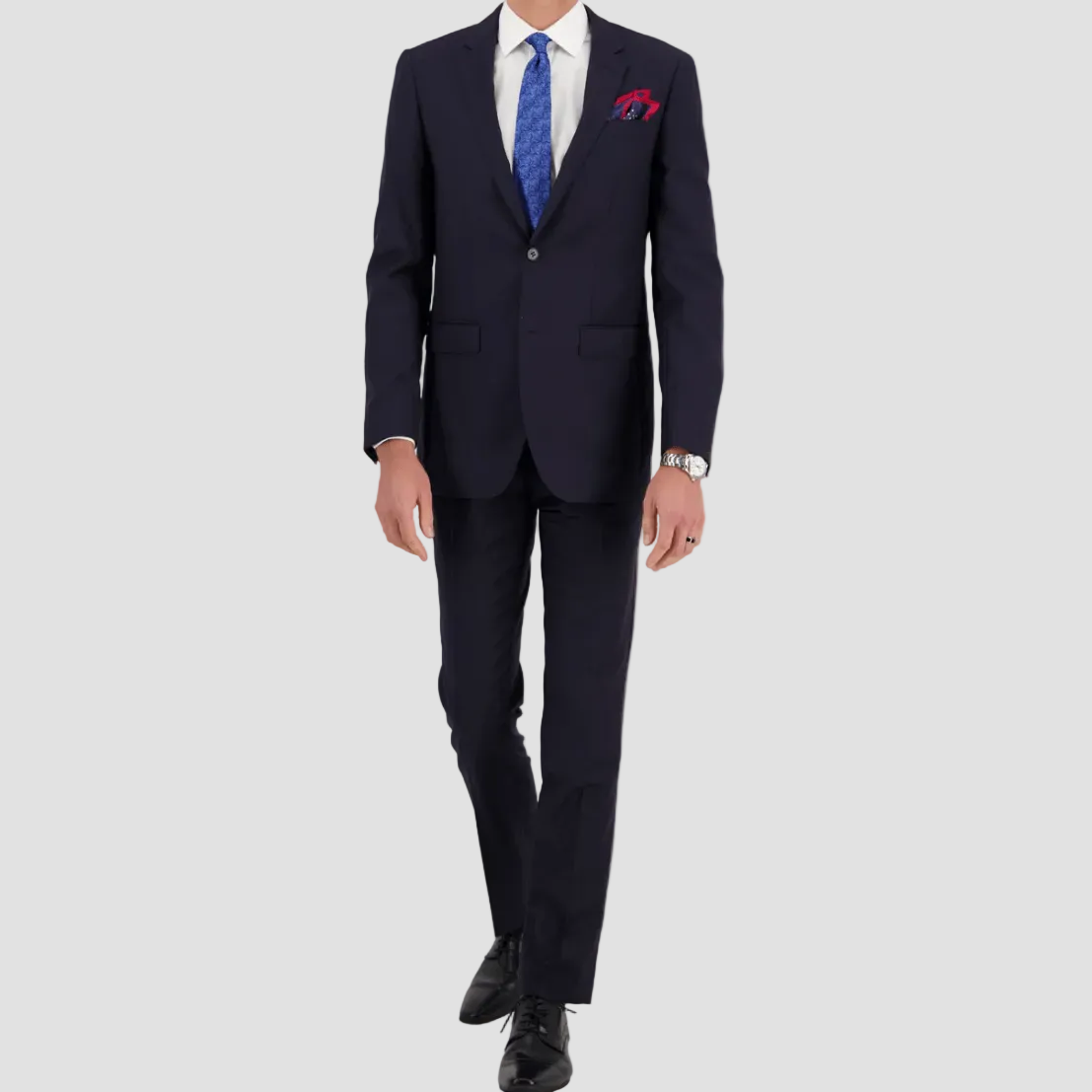 Savile Row’s tailored navy travel‑finish suit, crafted in Super 110’s Merino with a crisp two‑button front.