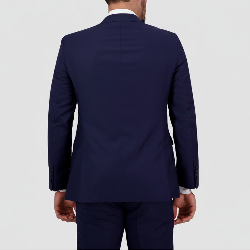 Marine blue Australian merino wool suit with a white shirt, four button sleeves and double vents at the back.