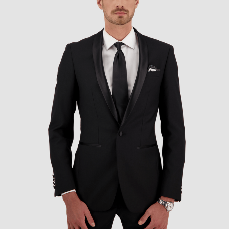 the front of the mens thomas tuxedo in black with a satin lapen and detail on the pockets