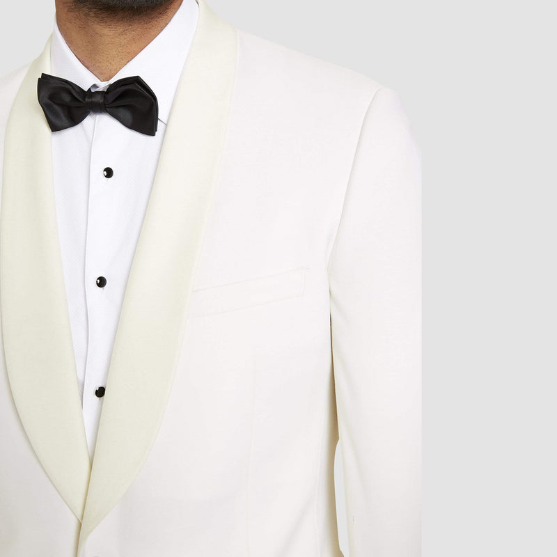 A close up view of the shawl lapel collar on the a front view of the studio italia slim fit prince shawl collar tuxedo jacket ST-436-81 in ivory